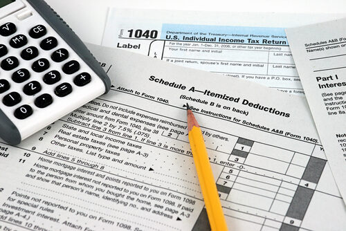 Schedule A to take itemized deductions.